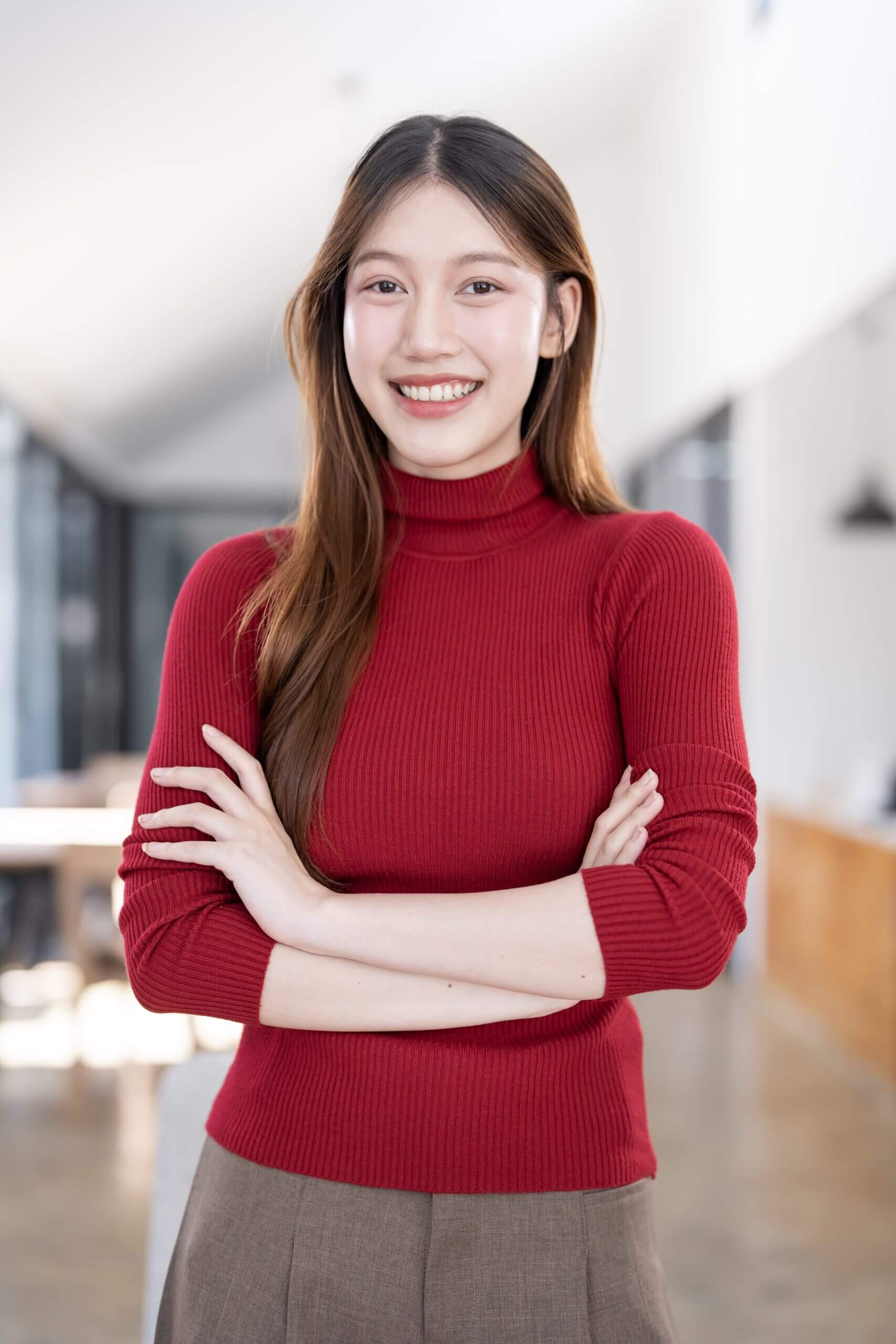 beautiful-woman-smiling-with-crossed-arms-2025-06-25-00-29-37-utc-scaled.jpg